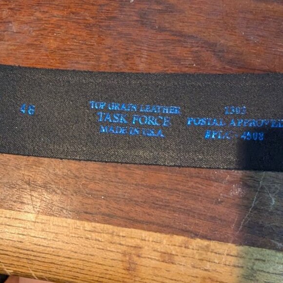 black belt with a silver buckle - Picture 2 of 2